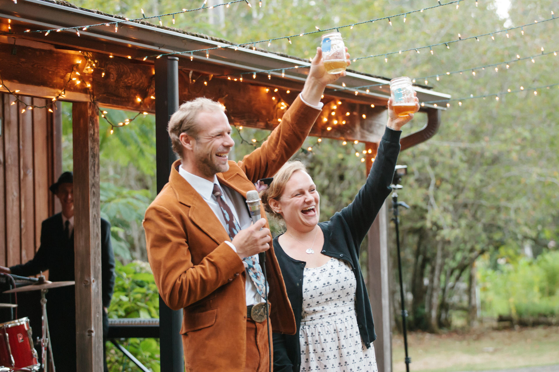 Couple giving toast at wedding by Portland Photographer Ali Smith