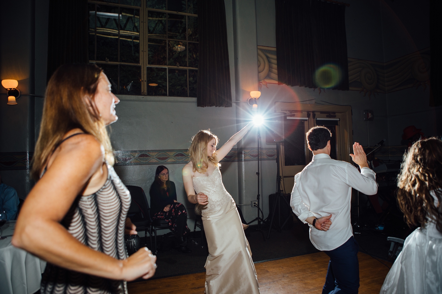 Bride and groom dancing by Portland documentary wedding photographer Alison Smith Thistledown Photography