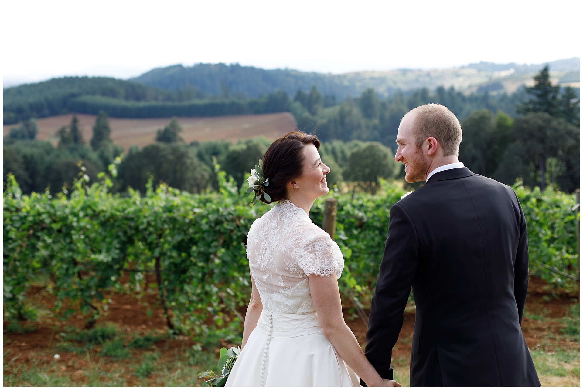 bride and groom at Willamette Valley Vineyards by oregon wedding photographer Alison Smith