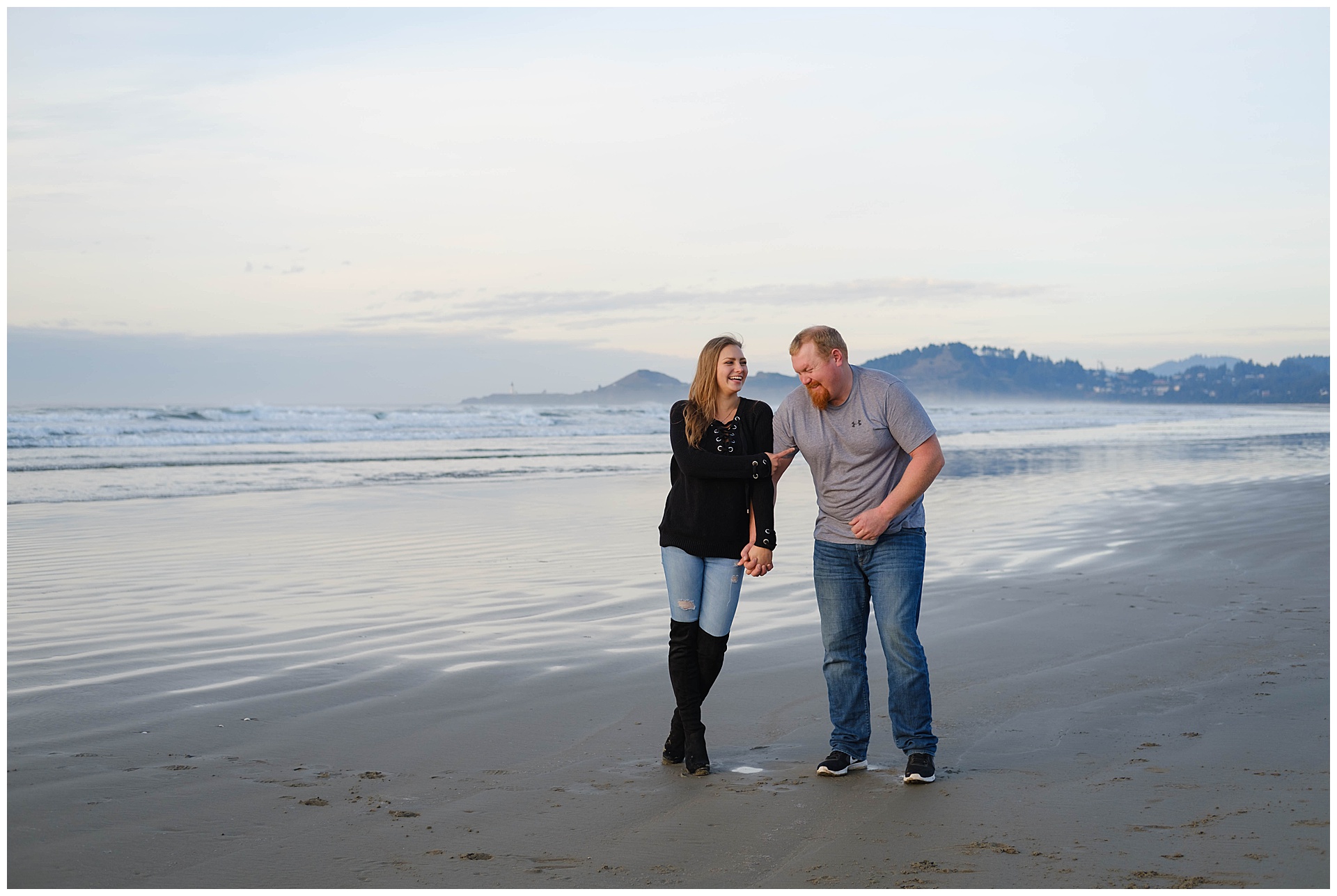 couple on the beach in Newport Oregon by Thistledown photography
