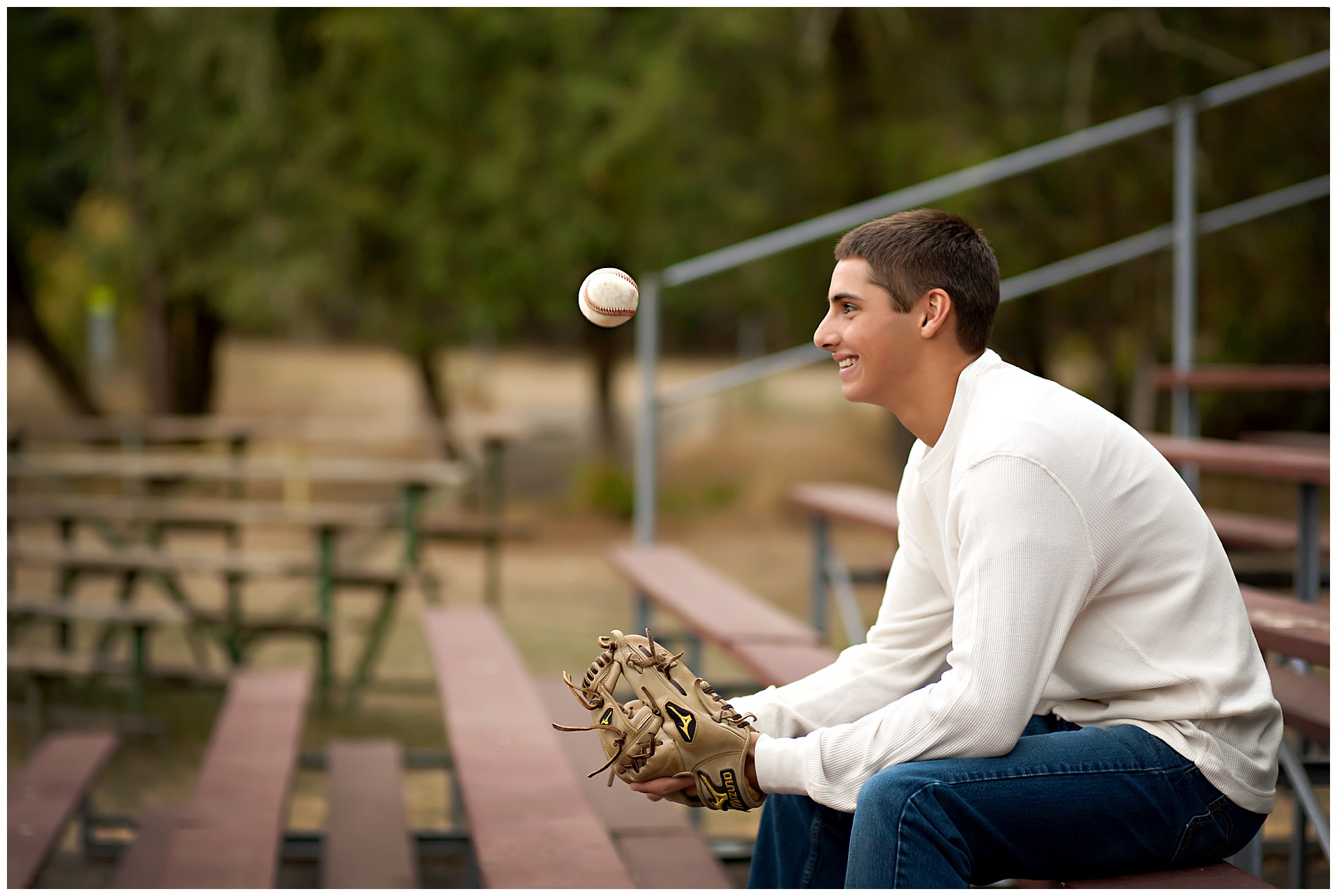 Senior portrait with baseball by Gig Harbor photographer Alison Smith